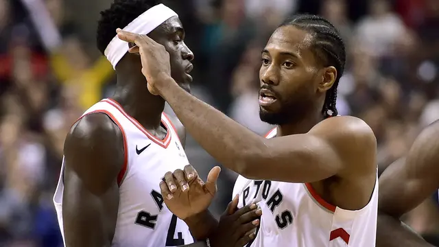 Selebrasi Kawhi Leonard saat Raptors mengalahkan Mavericks