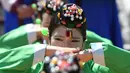 Seorang gadis muda Korea Selatan saat mengikuti upacara Coming of Age Day di desa Hanan Namsan di Seoul (21/5). Upacara Hari Kedewasaan adalah hari libur resmi untuk menghormati siapa saja yang baru menginjak usia 19 tahun. (AFP Photo/Jung Yeon-je)