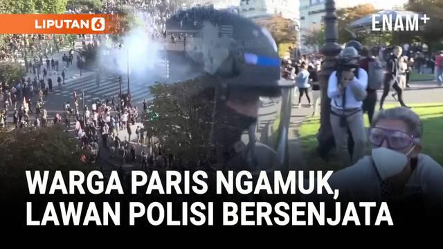 Bentrok pecah antara polisi dan ribuan demonstran di Paris pada Kamis (18/9), saat massa turun ke jalan menentang kebijakan Presiden Prancis Emmanuel Macron.