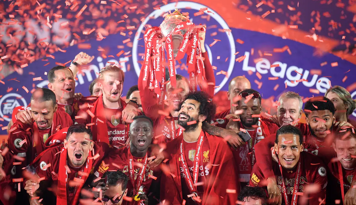 Pada musim 2019/20, Liverpool mampu memecahkan rekor dengan menyabet 30 kemenangan dari 34 laga. Anak asuh Jurgen Klopp juga mampu mengakhiri musim tersebut dengan raihan 99 poin yang mengagumkan atau selisih 18 angka dari Man City. (AFP/Pool/Laurence Griffiths)