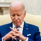 Dalam kesempatan itu, Presiden Biden menyampaikan bahwa kerja sama antara Indonesia dan Amerika Serikat yang meningkat menjadi kemitraan strategis komprehensif, menandakan era baru kerja sama antarkedua negara dalam berbagai bidang. "Termasuk di dalamnya adalah peningkatkan kerja sama kita dalam hal keamanan," ucap Biden. (AP Photo/Andrew Harnik)