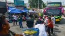 Peserta mengikuti lomba menarik bus di Terminal Lebak Bulus, Jakarta, Senin, 17 Agustus 2026. (KLY/ Arie Basuki)