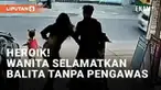 Aksi penyelamatan balita oleh seorang wanita viral di media sosial. Wanita yang hendak pergi dengan motornya tergugah saat melihat balita anak tetangga tiba-tiba bergerak menuju tengah jalan. Wanita itu menjatuhkan diri usai menangkap sang balita aga...