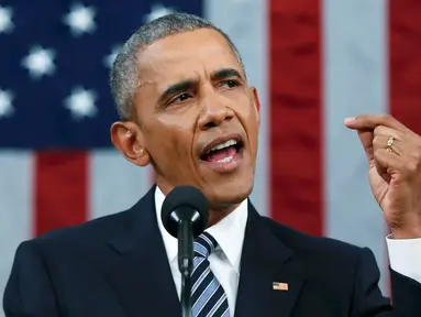 Presiden AS, Barack Obama menyampaikan pidato kenegaraan tahunan, State of the Union (SOTU) di hadapan parlemen di Washington, Selasa (12/1). Pidato ini merupakan pidato SOTU terakhir Obama setelah menjabat selama dua periode. (REUTERS/Evan Vucci/Pool)