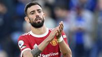 Kualtias Bruno Fernandes tak perlu diragukan lagi. Ia merupakan metronom sekaigus motor serang di lini tengah MU. Sejauh ini, Fernandes tercatat telah mencetak 49 gol dan 39 assist dalam 117 penampilannya di seluruh ajang. (AFP/Paul Ellis)
