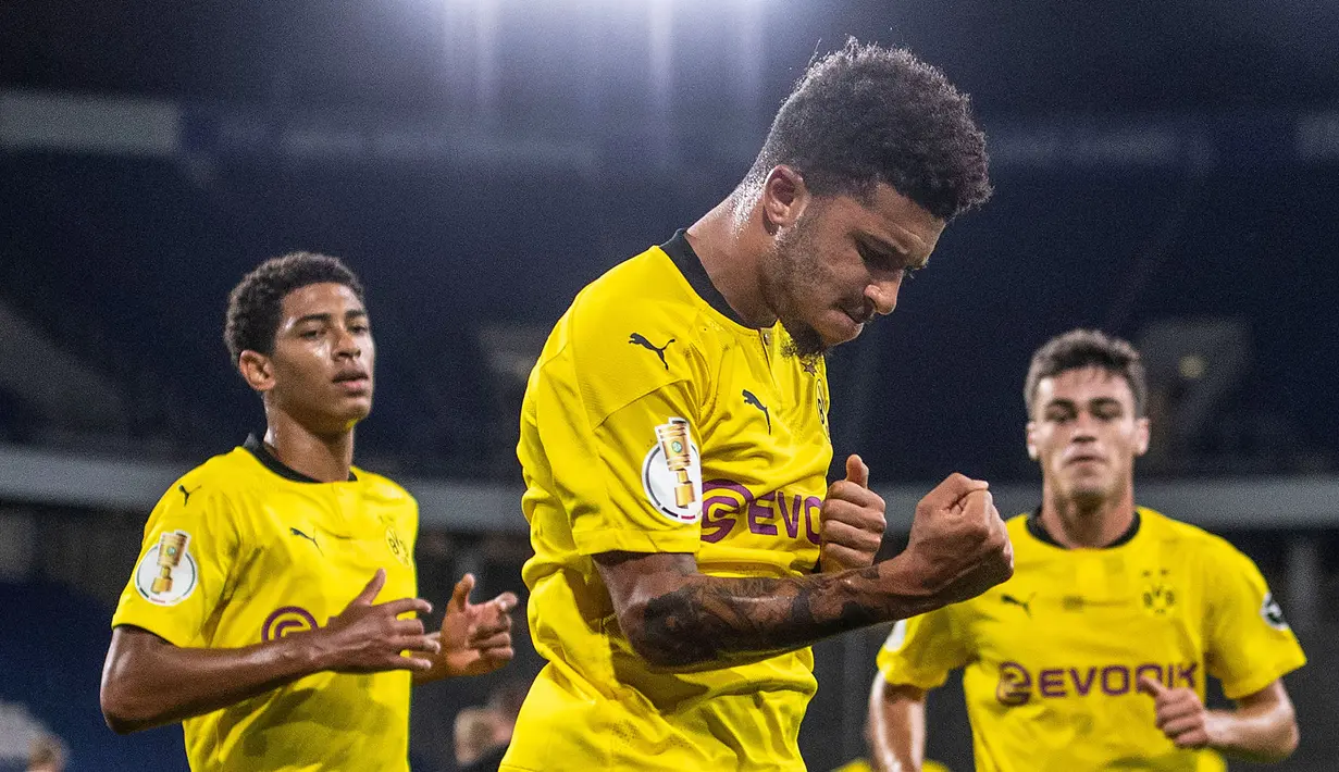 Gelandang Borussia Dortmund, Jadon Sancho, merayakan gol yang dicetaknya ke gawang MSV Duisburg pada laga DFB-Pokal di Schauinsland-Reisen-Arena, Selasa (15/9/2020). Borussia Dortmund menang 5-0 atas MSV Duisburg. (AFP/Marius Becker/dpa)