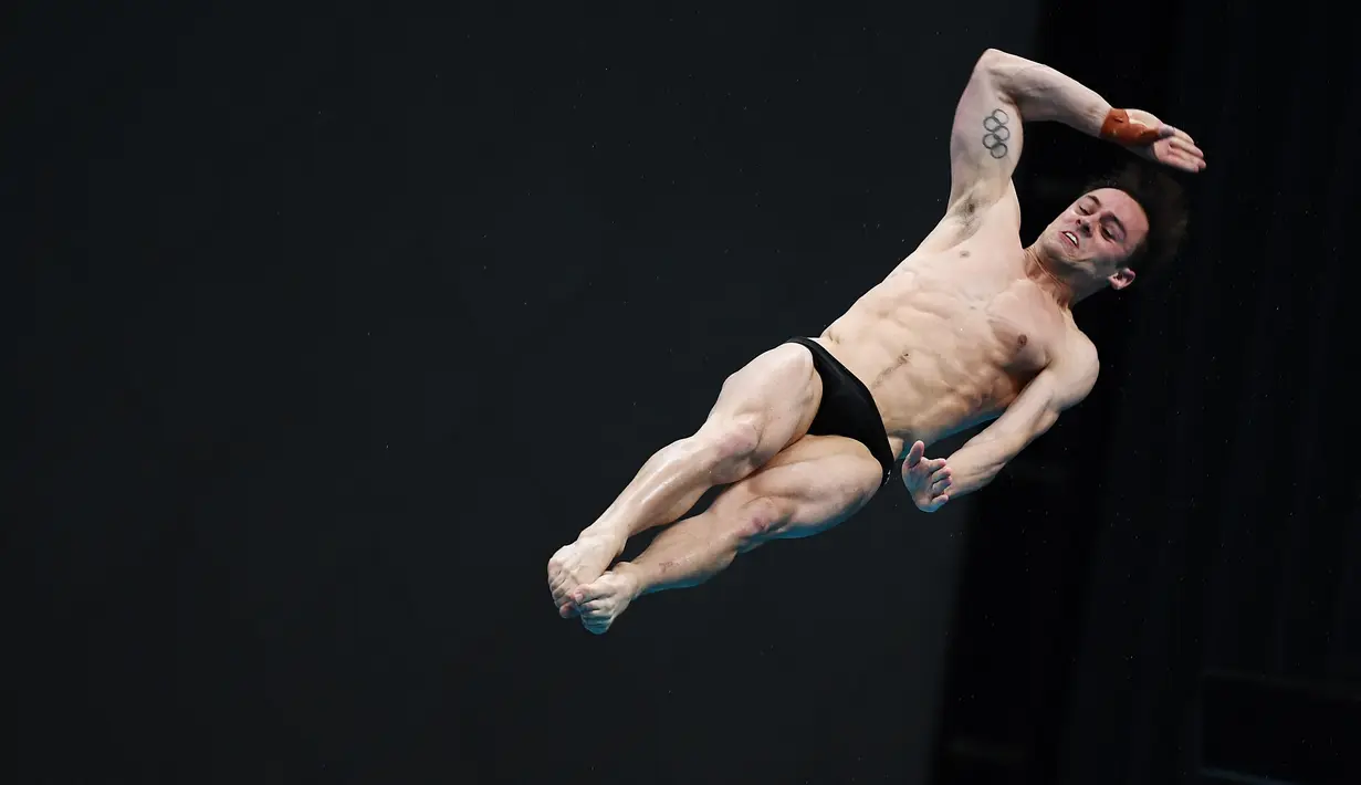 Atlet renang asal Inggris Tom Daley mengumumkan pensiun dari olahraga selam setelah memenangkan medali Olimpiade kelimanya di Paris. (Charly TRIBALLEAU / AFP)