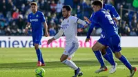 Eden Hazard tampil sebagai pengganti saat Real Madrid takluk 0-1 dari Getafe pada laga pekan ke-19 La Liga di Coliseum Alfonso Perez, Minggu (2/1/2022) malam WIB, (AFP/Javier Soriano)