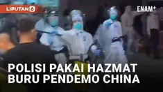Puluhan polisi anti huru hara berpakaian hazmat viral di media sosial, terjadi di China. Polisi berpatroli di kawasan perdagangan Guangzhou, Guangdong. Mereka memperingatkan masyarakat yang masih nekat beraktivitas di jam terlarang.