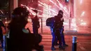 150 orang telah ditangkap selama aksi besar-besaran di seluruh negeri.  (AP Photo/Aurelien Morissard)