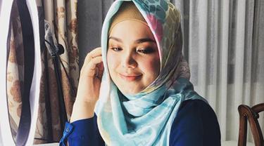 Siti Nurhaliza Perlihatkan Wajah Sang Anak untuk Pertama 