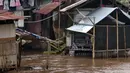 Luapan kali Ciliwung ini mengakibatkan rumah penduduk terendam air setinggi 50 hingga 75 cm. (merdeka.om/Imam Buhori)