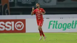 Pemain Persija Jakarta, Abdulla Yusuf Helal merayakan gol yang dicetaknya melalui eksekusi penalti ke gawang Persita Tangerang dalam laga pekan ke-6 BRI Liga 1 2022/2023 antara Persija Jakarta melawan Persita Tangerang di Stadion Patriot Candrabhaga, Bekasi, Rabu (24/8/2022) malam WIB. (Bola.com/M Iqbal Ichsan)