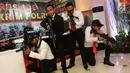 Petugas dari Satuan Reserse Mobil berpose saat berlangsungnya Bareskrim Polri Expo 2018 di Jakarta, Selasa (6/3). (Liputan6.com/Arya Manggala)