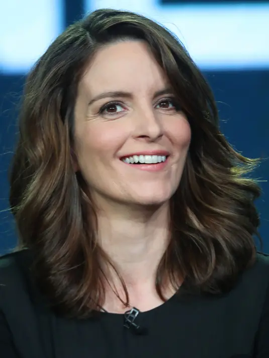 Tina Fey menunggu hingga berusia 24 tahun dan menikah dengan suaminya, Jeff Richmond. Ia sangat menjunjung tinggi nilai Kristianinya. (Frederick M. Brown / GETTY IMAGES NORTH AMERICA / AFP)