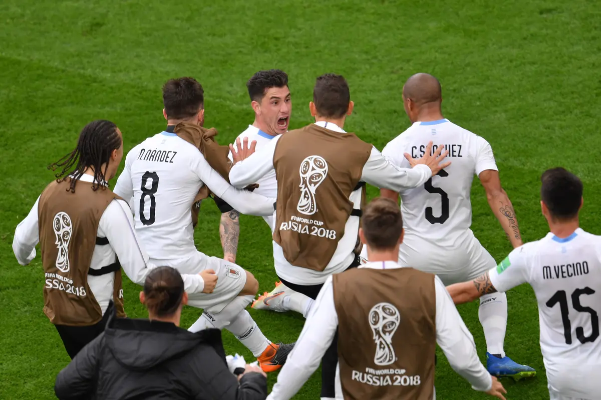 Jose Maria Gimenez menjadi pahlawan kemenangan Timnas Uruguay menghadapi Mesir di Ekaterinburg Arena, Jumat (15/6/2018). Timnas Uruguay menang 1-0. (HECTOR RETAMAL / AFP)