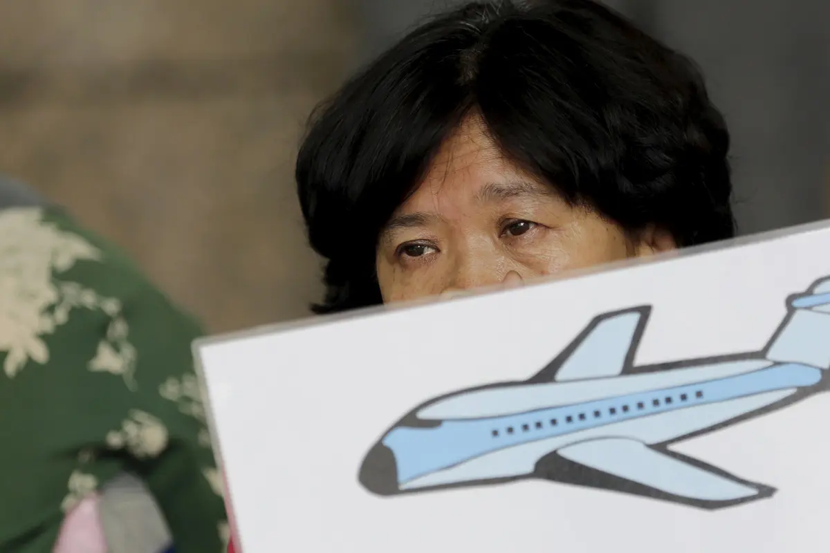 20150806-Puing MH370 Terkonfirmasi, Keluarga Minta Pencarian Dilanjutkan-China
