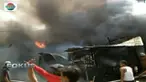 Asap hitam tebal bergulung-gulung disertai kobaran melahap sejumlah bangunan di kawasan Sunter, Tanjung Priok, Jakarta Utara.