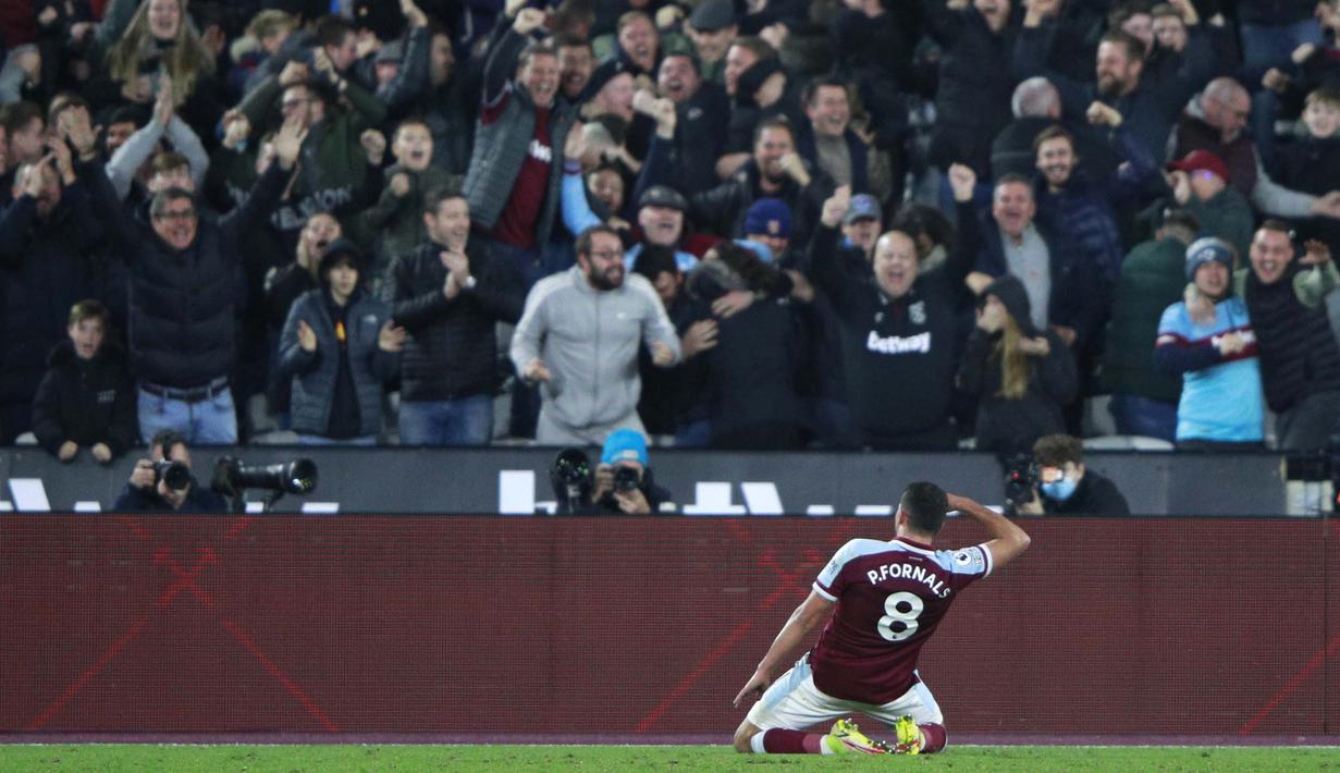 Namun, West Ham United berhasil kembali unggul pada menit ke-66. Kali ini Pablo Fornals mencetak gol atas namanya sendiri setelah menerima umpan terobosan dari Jarrod Bowen dan membawa The Hammers unggul 2-1 atas Liverpool. (AP Photo/Ian Walton)