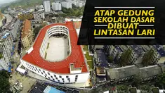Video gedung sekolah dasar di Taizhou, China di desain Lintasan lari untuk para siswa dan siswi untuk selalu berolahraga