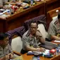 Kapolri Jenderal Tito Karnavian bersama Wakapolri Komjen Pol Syafruddin mengikuti rapat dengan Komisi III di Gedung Parlemen Senayan, Jakarta, Senin (5/12). Selain itu, rapat juga membahas evaluasi Pasca Demo 411 dan 212 kemarin. (Liputan6.com/JohanTallo)