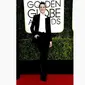 Tampil beda dengan kejutan bergaya maskulin,  Evan Rachel Wood tak memilih gaun malam untuk menghadiri Golden Globe 2017 kali ini. (Foto: www.vogue.co.uk)