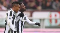 Alex Sandro rayakan golnya untuk Juventus ke gawang Torino (MARCO BERTORELLO / AFP)