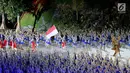 Atlet kontingen Indonesia memasuki stadion pada pembukaan Asian Games 2018 di Stadion Utama Gelora Bung Karno (SUGBK), Jakarta, Sabtu (18/8). Kontingen Indonesia mendapat sambutan meriah penonton yang hadir. (Liputan6.com/Ferbian Pradolo)