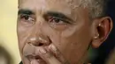 Presiden AS Barack Obama memaparkan langkah yang akan diambil pemerintahannya untuk mengurangi kekerasan senjata di Gedung Putih, Selasa (5/1). Obama menangis mengingat banyaknya anak-anak yang menjadi korban penembakan massal (REUTERS/ Kevin Lamarque)