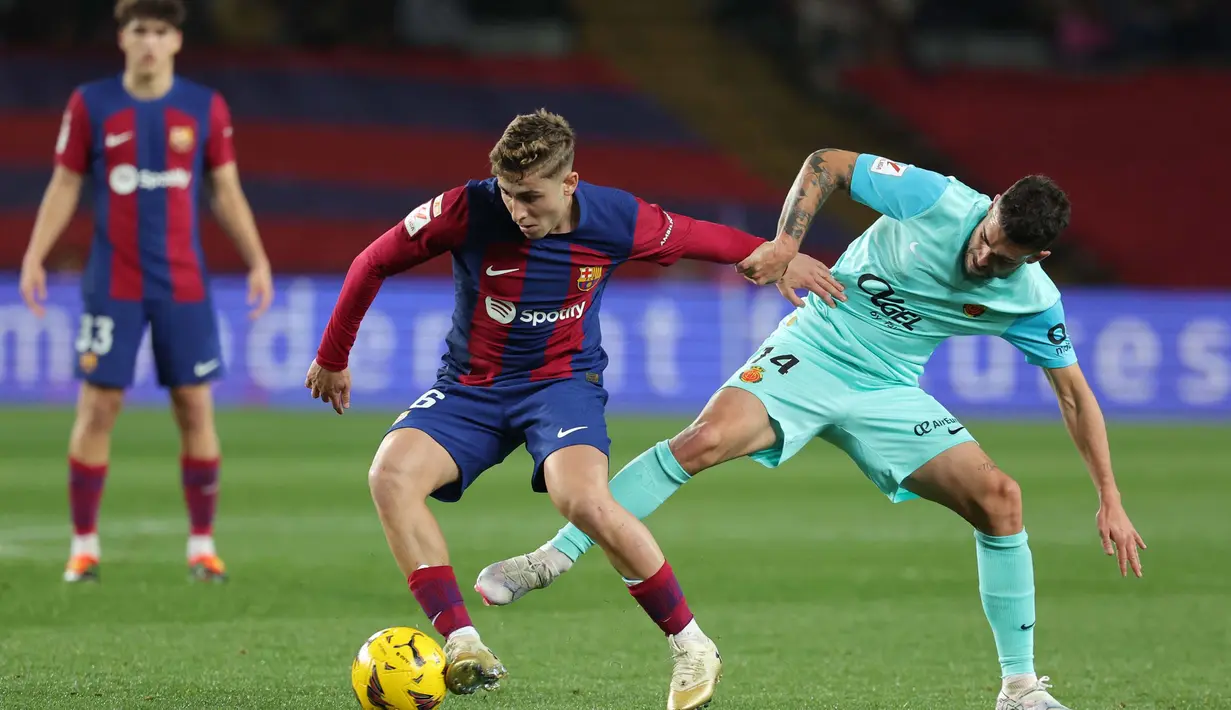 Gol Lamine Yamal menjadi penentu kemenangan Barcelona saat melawan Mallorca. (LLUIS GENE/AFP)