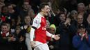 Gelandang Arsenal, Mesut Ozil, merayakan gol ynag dicetaknya ke gawang Bournemouth pada laga Premier League di Stadion Emirates, Inggris. (Reuters/Stefan Wermuth)