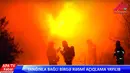 Regu pemadam kebakaran dikerahkan ke sebuah pusat rehabilitasi pecandu narkoba di Ibu Kota Baku, Azerbaijan, Jumat (2/3). Kebakaran diduga terjadi akibat gangguan  pada jaringan listrik di bangunan utama kompleks rehabilitasi tersebut. (APA TV via AP)