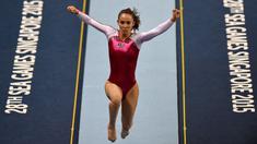 Atlet senam Malaysia, Farah Ann Abdul Hadi saat tampil pada SEA Games 2015 di Singapore, (9/9/2015). Farah akan kembali tampil pada SEA Games 2017 di Malaysia. (AFP/Roslan Rahman)