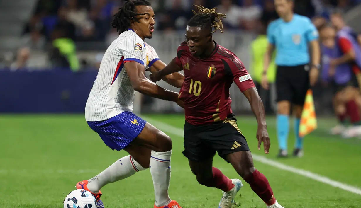 Hingga akhir babak pertama, skor 1-0 untuk keunggulan Prancis tidak berubah. (Franck FIFE/AFP)