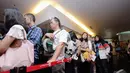 Antrian para Cinemaholic jelang menyaksikan film Doraemon di Blitz Megaplex, Jakarta (13/12/2014). (Liputan6.com/Faizal Fanani)