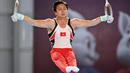 Nguyen Van Khanh Phong dari Vietnam bertanding dalam nomor gelang-gelang cabang olahraga senam artistik Pesta Olahraga Asia Tenggara (SEA Games) ke-32 di Phnom Penh, Kamboja, Selasa (9/5/2023). (Photo by Tang Chhin Sothy / AFP)