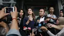 Bunga Zainal memberikan keterangan pers di Polda Metro Jaya, Jakarta, Senin (27/2). Bunga mengaku telah memberikan somasi dua kali tetapi tak digubris oleh oknum bernama HW (Liputan6.com/Herman Zakharia)