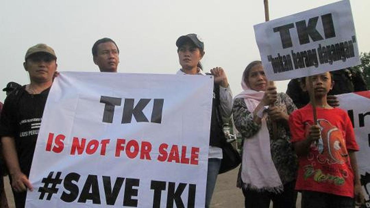 Aksi Migrant Care demo iklan obral TKI di Istana