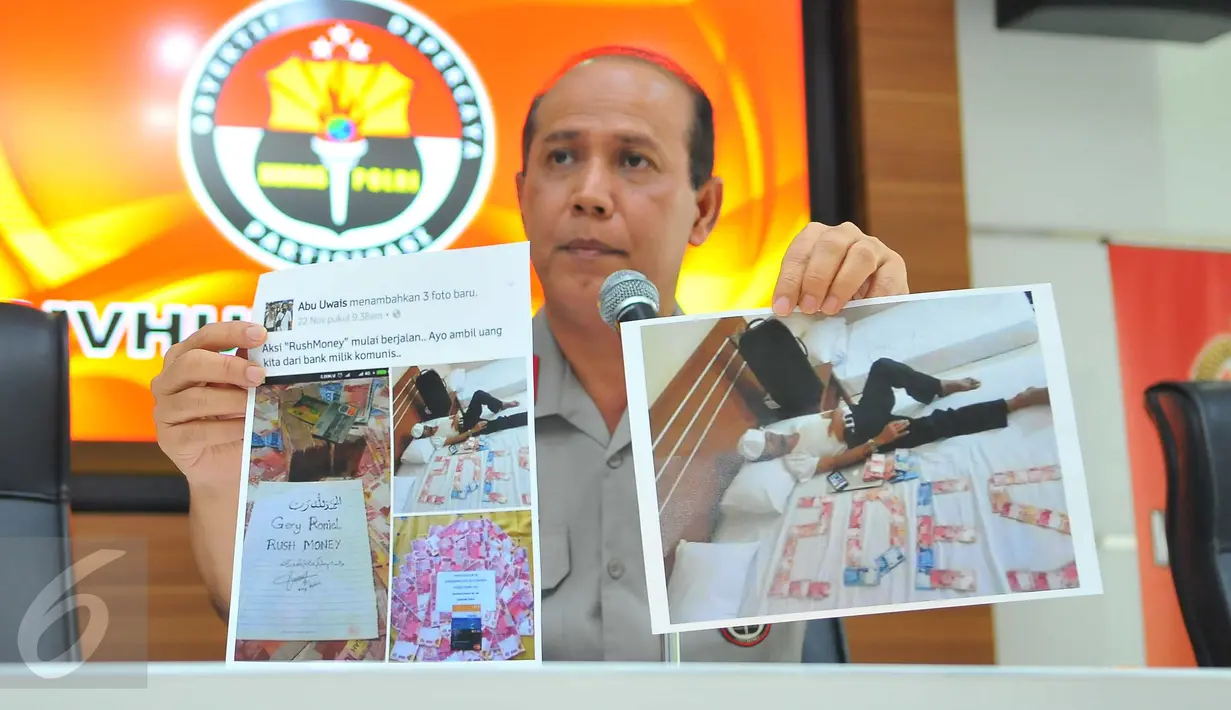 Kadiv Humas Mabes Polri, Irjen Boy Rafli Amar menunjukan foto pelaku penyebar isu Rush Money di Mabes Polri, Jakarta, Sabtu (26/11). Polisi telah menangkap penyebar ajakan untuk melakukan rush money melalui media sosial. (Liputan6.com/Angga Yuniar)