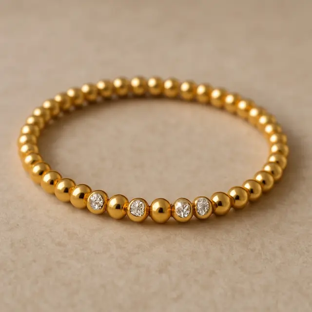 Model Gelang Emas Permata Kecil untuk Ibu-ibu Usia 40 Tahun (Foto: ChatGPT)