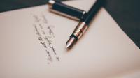 Ilustrasi menulis, pantun, puisi. (Photo by &Aacute;lvaro Serrano on Unsplash)