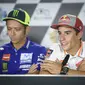 Pembalap Movistar Yamaha, Valentino Rossi dan rider Repsol Honda, Marc Marquez dikenal memiliki hubungan yang buruk di lintasan MotoGP. (Jure Makovec / AFP)