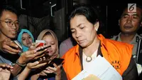 Merry Purba resmi ditetapkan tersangka dan ditahan KPK terkait suap putusan penanganan perkara dipengadilan Tipikor Medan.(merdeka.com/Dwi Narwoko)