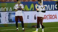 Kiper Timnas Spanyol Iker Casillas dan David De Gea ( Byline / Source / Credit JOSE JORDAN / AFP)