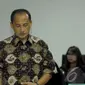 Eks Deputi Gubernur Bank Indonesia Budi Mulya mengaku sedih dan kecewa di PN Tipikor, Jaksel, Rabu (16/7/2014) (Liputan6.com/Miftahul Hayat)