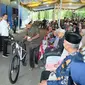 Presiden Jokowi saat menyalurkan bantuan pangan cadangan beras pemerintah di GDT Hutalombang, Kabupaten Padang Lawas, Sumatera Utara (Sumut), Jumat (15/3/2024) (Foto: Istimewa)