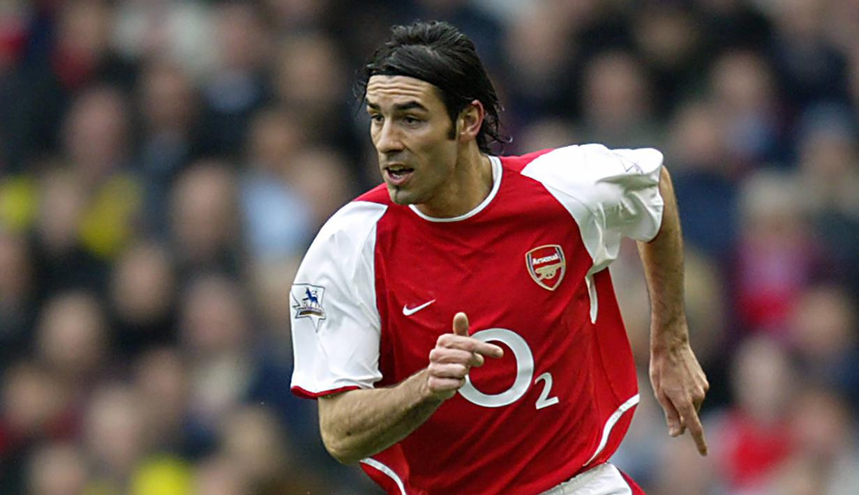 Robert Pires - Pires pernah membela klub Arsenal dan Aston Villa. Selama kariernya di Premier League, Pires telah mengemas 63 gol. (AFP/Odd Andersen)