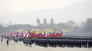 Personel militer berpartisipasi dalam parade pada Hari Angkatan Bersenjata di Naypyitaw, Myanmar (27/3/2021). Myanmar saat ini sedang dalam kekacauan sejak  para jenderal militer menggulingkan dan menahan pemimpin sipil Aung San Suu Kyi pada Februari. (AP Photo)