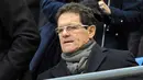 Pelatih Inggris, Fabio Capello duduk di tribun menyaksikan laga putaran kelima FA Cup antara Manchester City dan Stoke City di City of Manchester Stadium, 13 Februari 2010. AFP PHOTO / ANDREW YATES