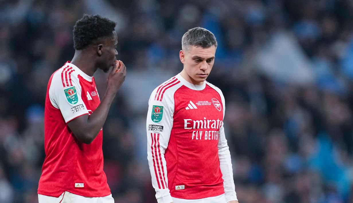 Kalah dari Manchester City di final Carabao Cup 2026 membuat puasa gelar Arsenal berlanjut, menyebabkan rasa sakit dan kekecewaan mendalam bagi tim. (AP Photo/Maja Smiejkowska)